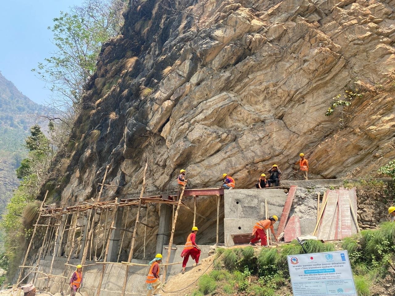Local workers are building a retaining wall for the Bhalmasota Irrigation Canal in Aathbiskot-13, Rukum West.  © UN-Habitat Nepal